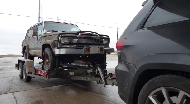 Illustration for article titled Towing An Old Jeep Through An Ice Storm With A 707 HP Jeep Grand Cherokee Trackhawk Was Truly Terrifying
